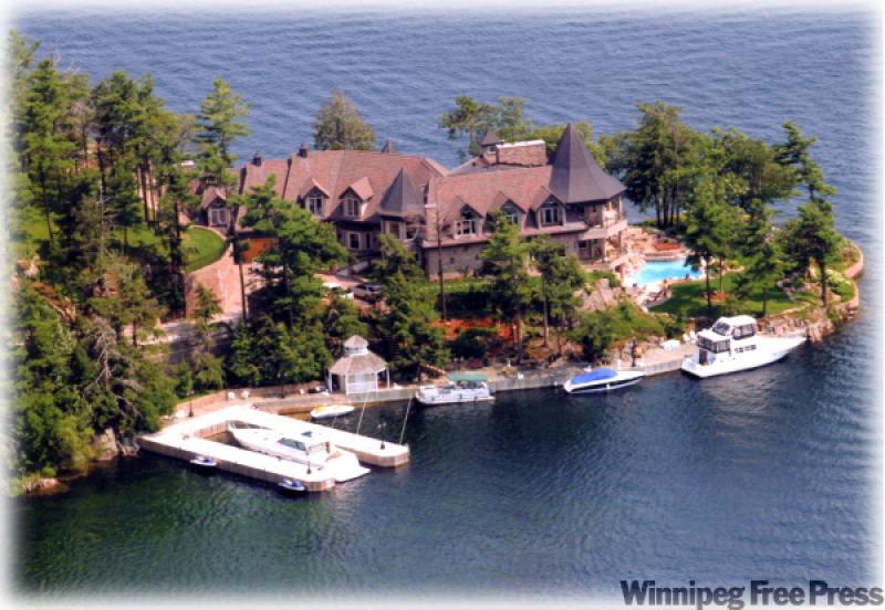 Set on nearly 14 acres on Eagle Point in the Thousand Islands, the property includes a main home of 13,700 square feet and a 7,000-sq.-ft. guest house and caretaker's home. You can dock the yacht along the 1,600 feet of riverfront. 