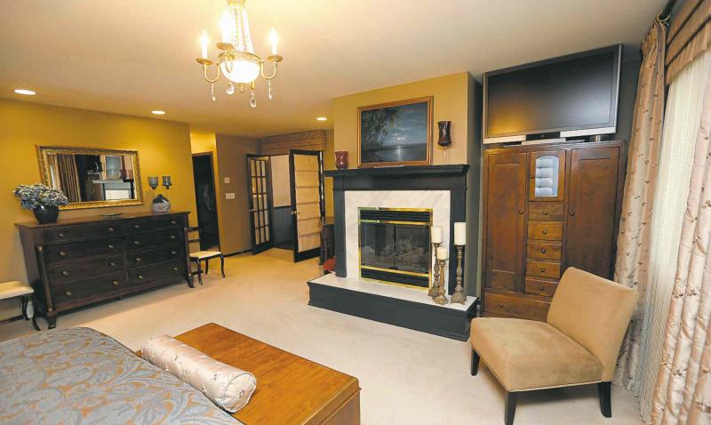 The cavernous and private master suite also features a gas fireplace.