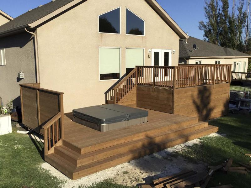 <p>By introducing a visually appealing lower tier to the mix, I was able to avoid having to build an unsightly and massive staircase leading up to the main level of the LaRocque's home from their yard. </p>