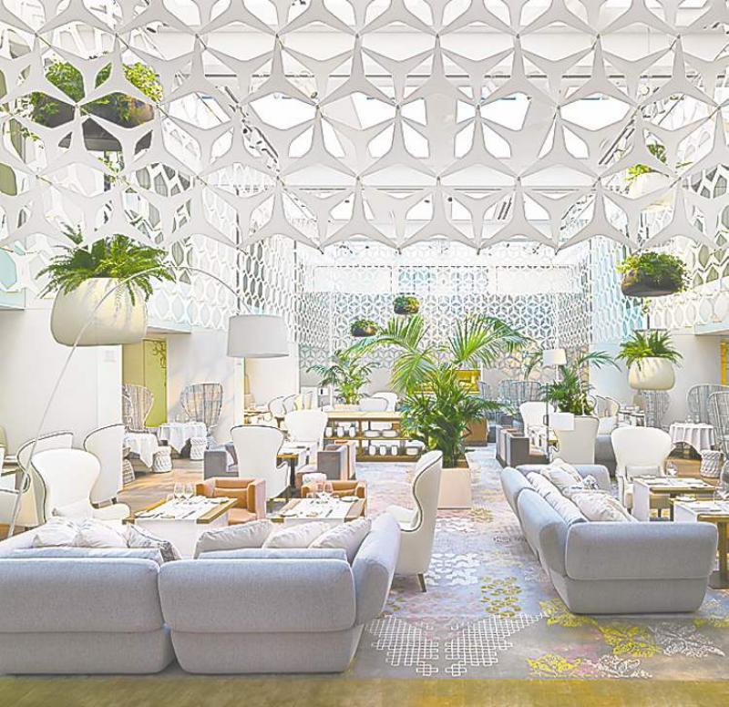 Splendid metalwork shapes create a magical dining room ceiling at the Mandarin Oriental Hotel in Barcelona.