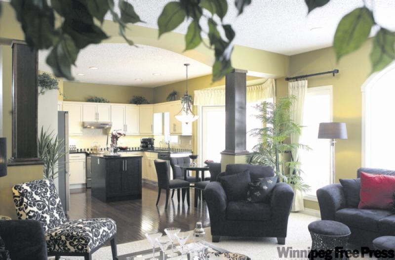 The Montego's 2,077 square feet is not only divided equally between floors, but is divided interestingly, with arches and columns and first-rate millwork.