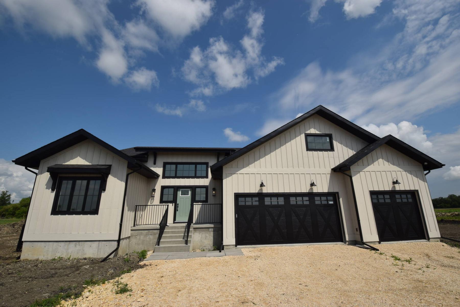  <p>Photos by Todd Lewys / Winnipeg Free Press</p>
                                <p>This large bungalow sits on a huge two-acre lot, and features a country-modern design that meshes perfectly with its countrified surroundings.</p> 