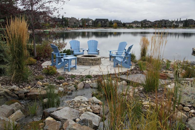 <p>barkman</p><p>A Grand Flagstone patio blends well with the surrounding natural environment.</p></p>