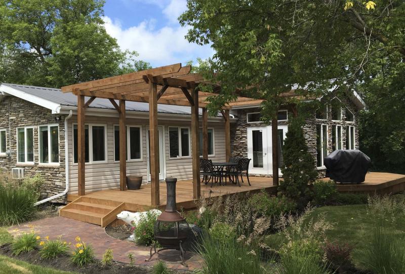 <p>Photos by Marc LaBossiere / Winnipeg Free Press</p><p>An eight-post pergola set atop a 30-foot-long deck creates an inviting outdoor living space. </p></p>
