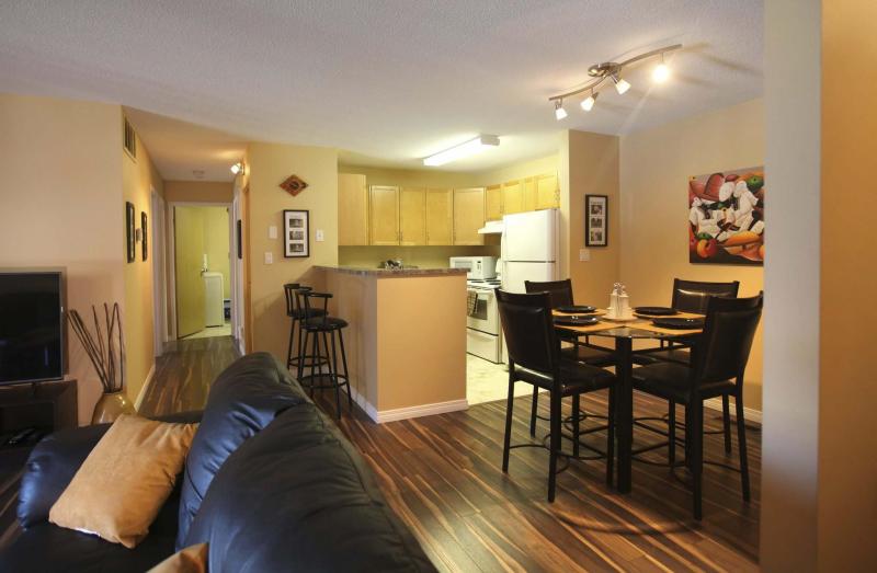 <p>The open dining area overlooks the living room.</p></p>
