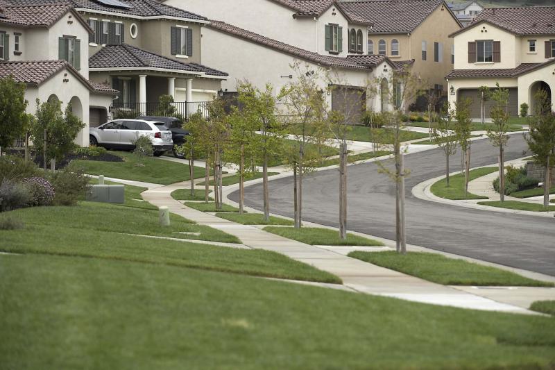 <p>Randall Benton / Sacramento Bee</p><p>Although it might seem natural to cut the lawn as short as possible, experts recommend letting it grow longer and mowing it more frequently.</p>