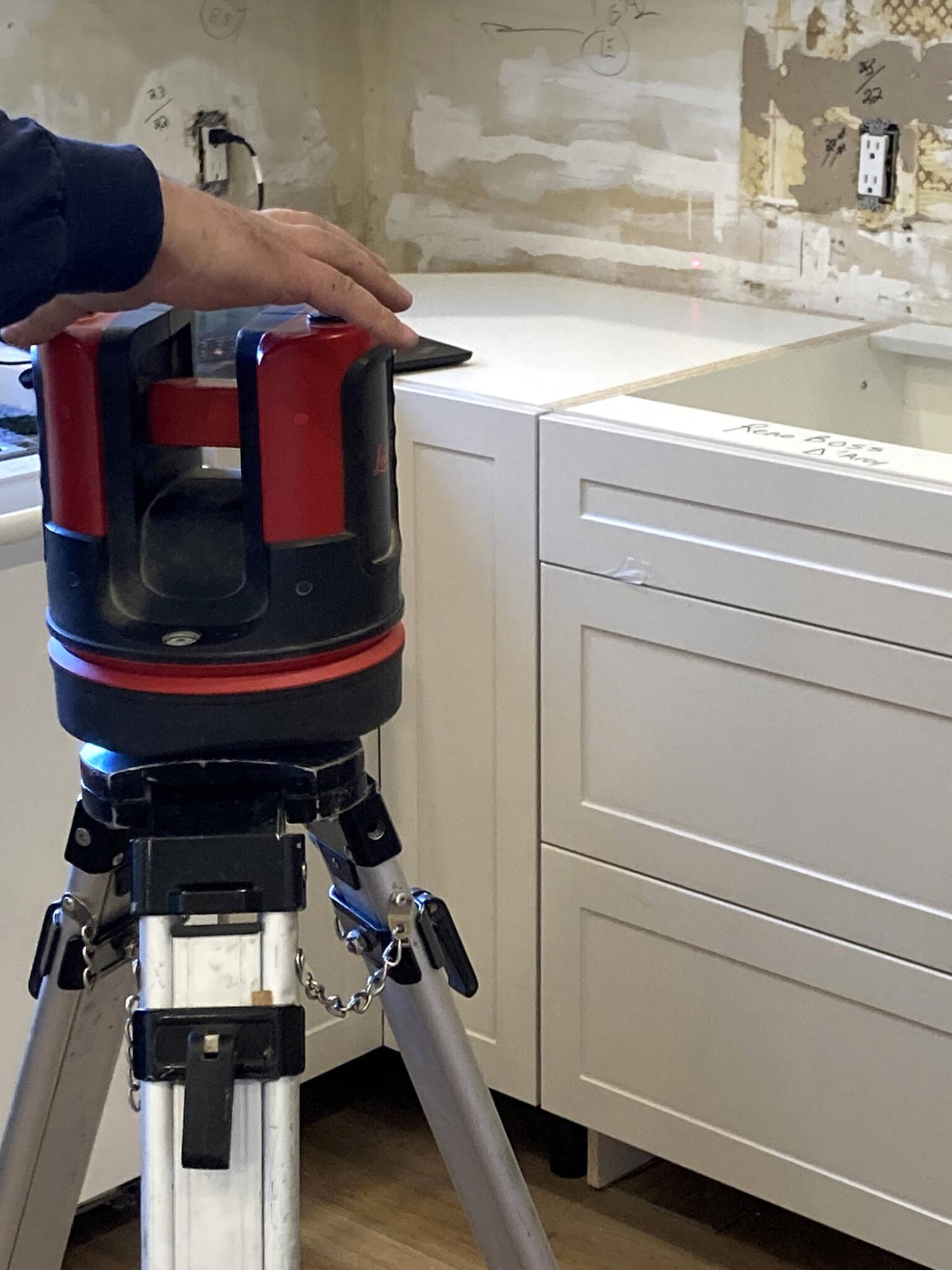  <p>Photos by Marc LaBossiere / Winnipeg Free Press</p>
                                <p>The quartz installation process begins with proper measurements, using a laser tool that records depths and stores the dimensions on a laptop.</p> 