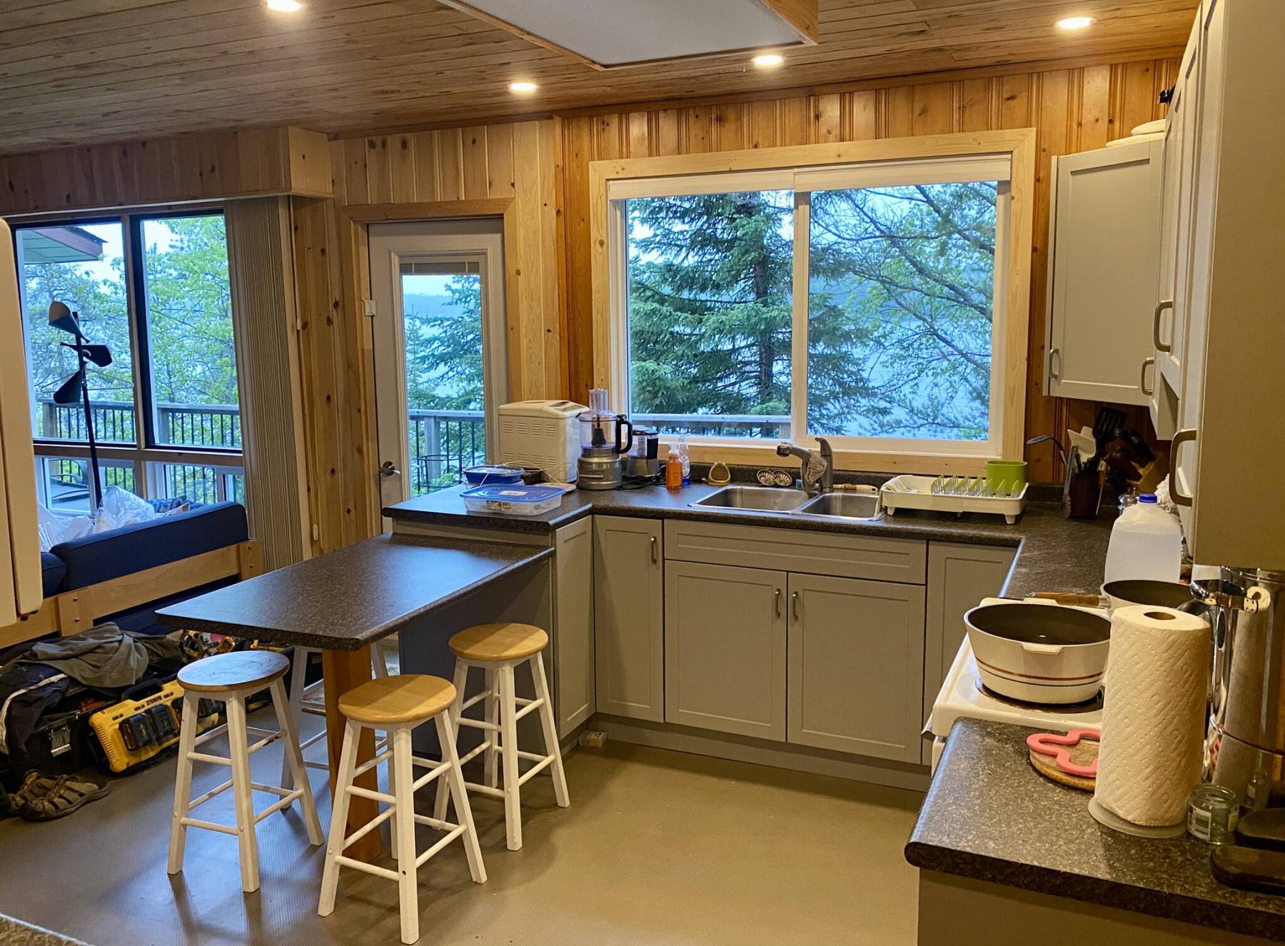  <p>Once the hidden panel upon which the lower counter tier is mounted the reassembled peninsula island configuration conceals the accidental omission of that replacement panel.</p> 