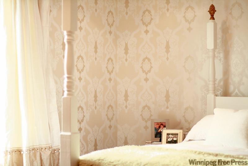 After: My new bedroom portrays the essence of a sophisticated boudoir -- the glamour of lush window coverings and elegant wallpaper is back.