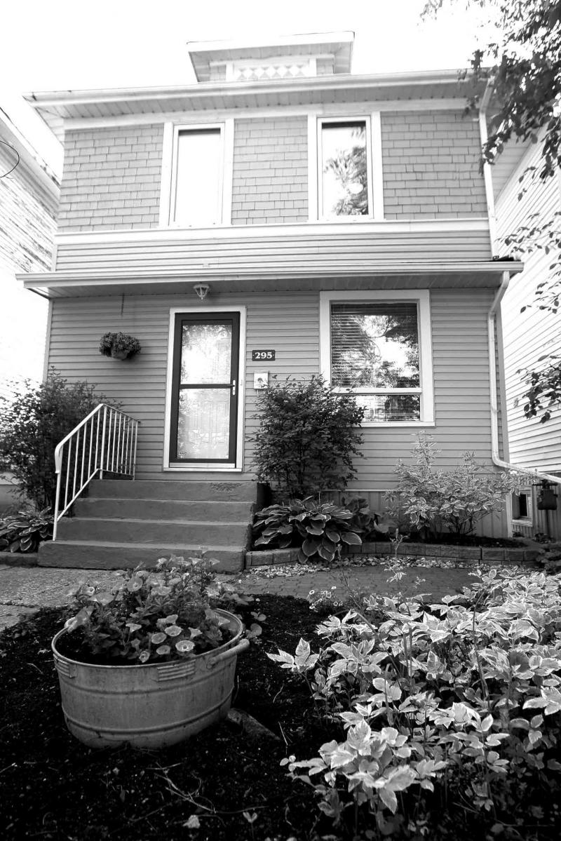 This character home for sale on Aubrey Street in Wolseley has been extensively updated into a contemporary home.