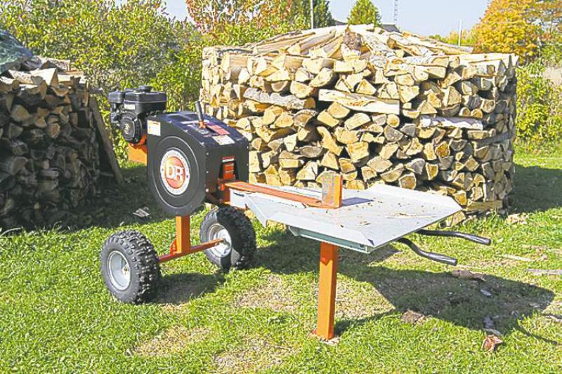 The RapidFire wood splitter uses inertia from two 75-pound flywheels to get the job done about four times faster than splitters with engines twice as large. 
