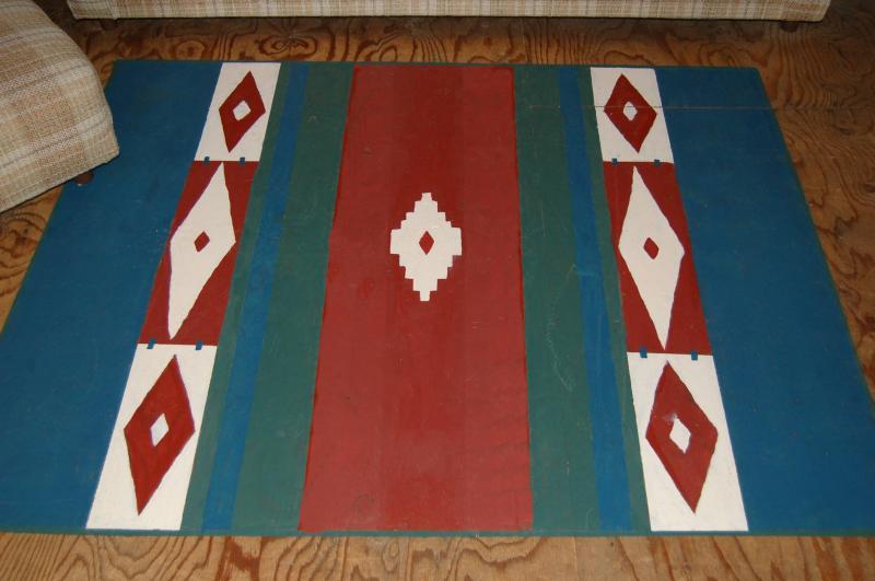 THis rug is actually painted on the floor.