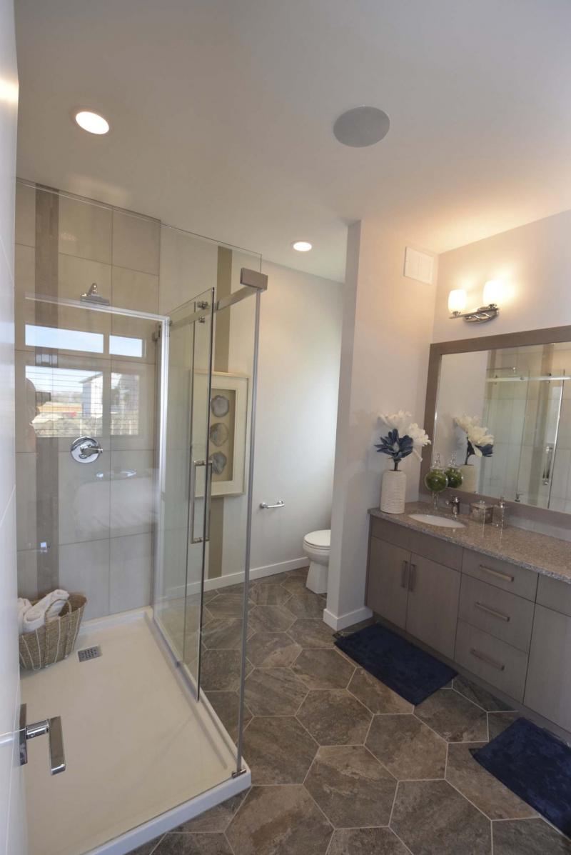 <p>Todd Lewys / Winnipeg Free Press</p><p>A tranquil ensuite bathroom has dual sinks and a custom shower.</p>