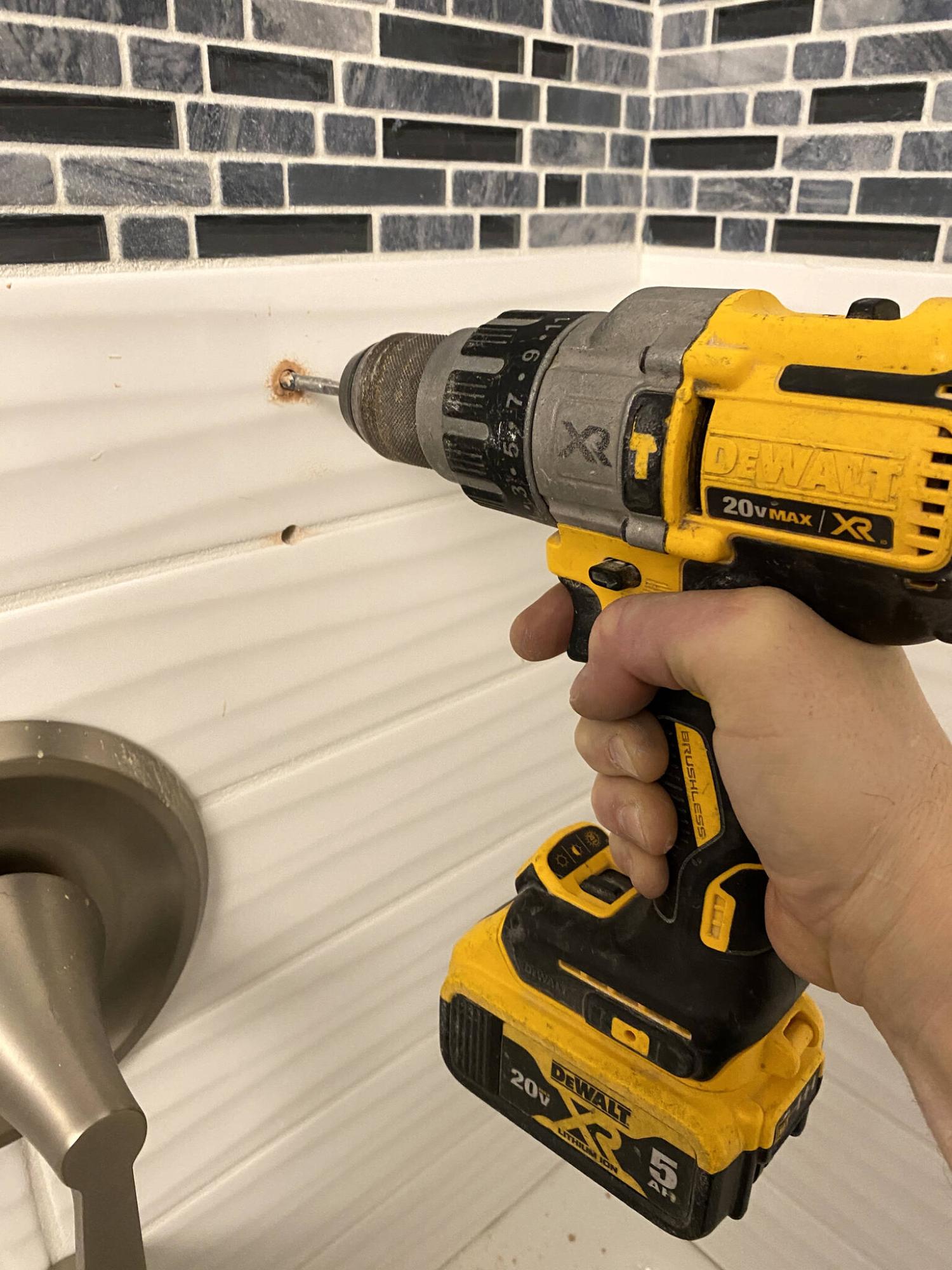  <p>Marc LaBossiere / Winnipeg Free Press</p>
                                <p>A diamond-tip masonry bit and light pressure, with water to periodically cool the bit, is the trick when drilling tile.</p> 
