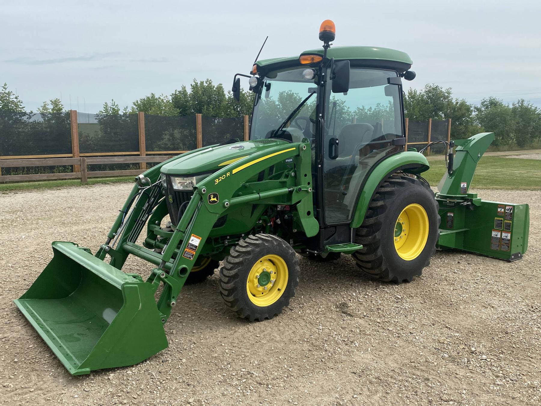  <p>Photos by Marc LaBossiere / Winnipeg Free Press</p>
                                <p>The John Deere 3-Series 3046R is equipped with a climate-controlled cab, 74-inch rear Frontier snowblower, and 54-inch loader bucket.</p> 
