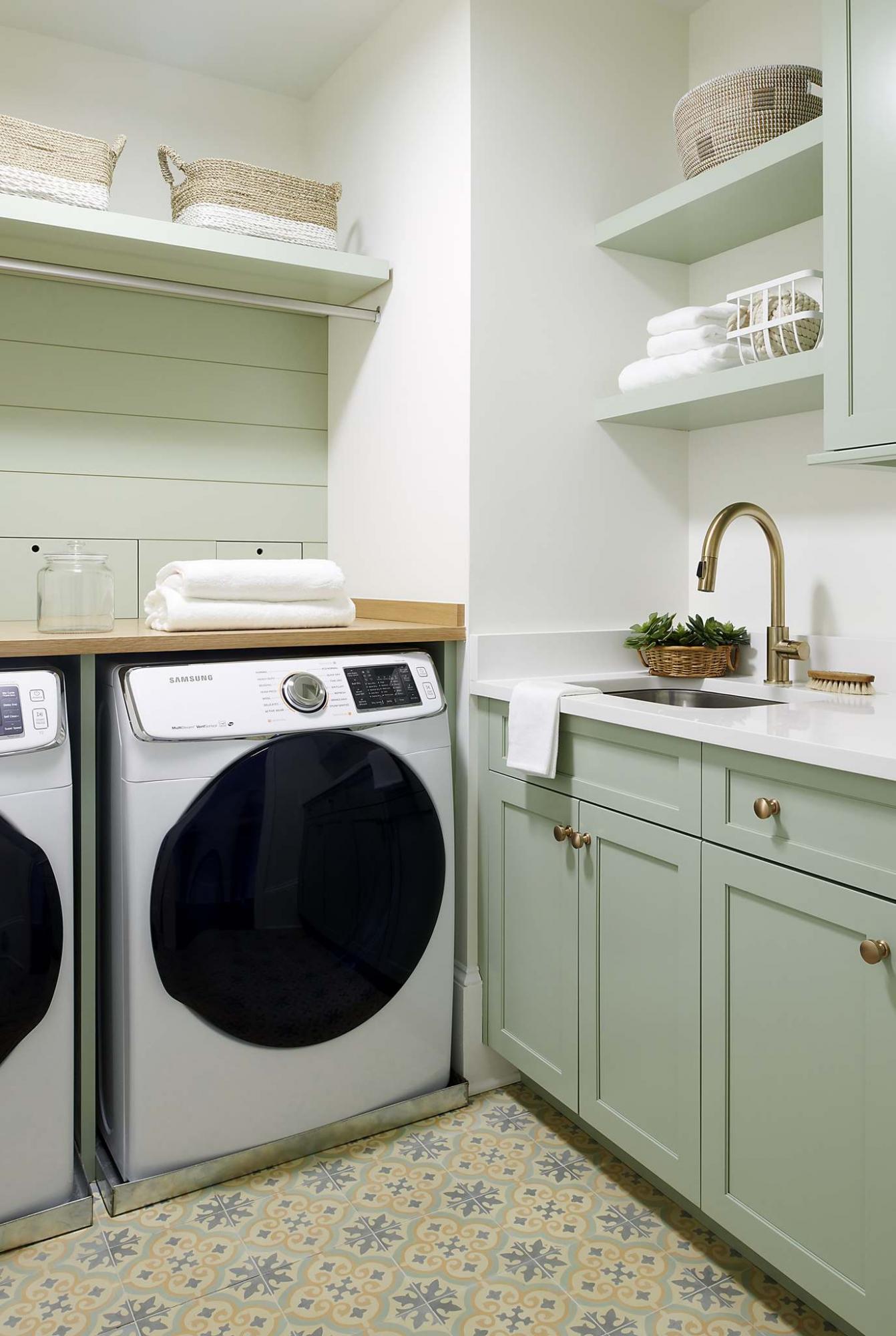 <p>Rebecca McAlpin</p><p>A patterned cement floor gives this small but lovely laundry room a fresh new look. </p>