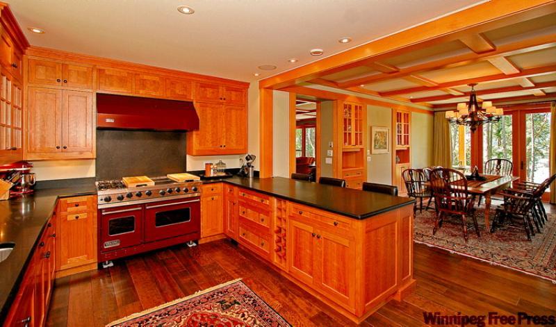 Today the dining area, kitchen and sitting area are all part of one spacious room, but 50 years ago these would have been three small rooms. 