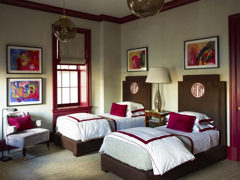 <p>A bedroom for boys by designer Steven Gambrel and architect Martin Sosa has dramatic trim painted in Pratt &amp; Lambert&rsquo;s Garnet. (MUST CREDIT: Eric Piasecki)</p>