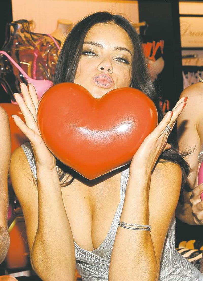 Victoria's Secret Angel Adriana Lima poses at a Valentine's Day promotional event on Wednesday, Feb. 8, 2012 in New York. (AP Photo/Evan Agostini)