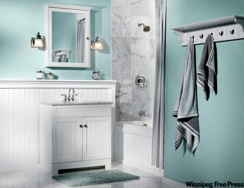 The lovely, Old Worldstyle Moen bathroom pictured here has a ton of visual interest and movement. This is achieved by the choice of using soft lines and curved elements in the space.