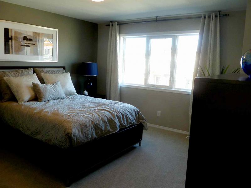The master suite is large and bright.