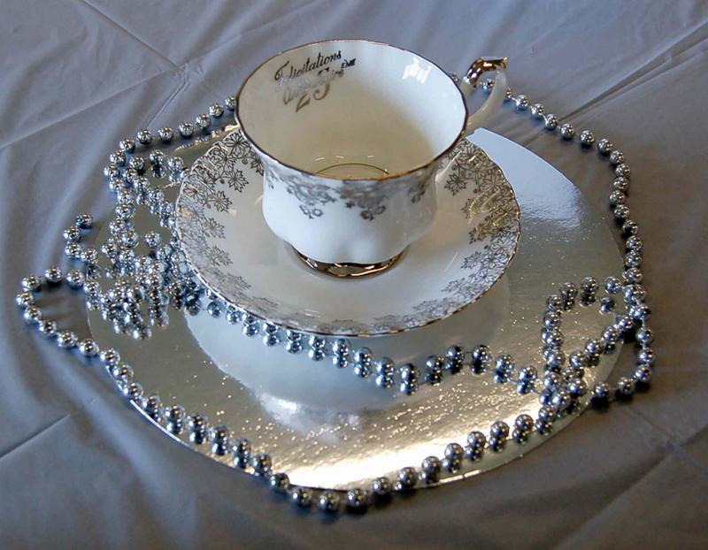 connie oliver / winnipeg free press
25th anniversary dishes from thrift stores make interesting centrepieces.