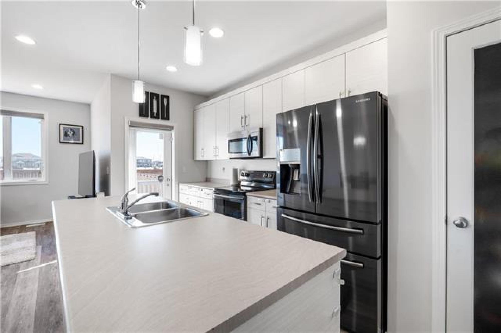 207 Phoenix Way, R2V 5B3, 3 Bedroom, 2 Storey for sale North West