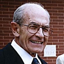 DR. HAROLD KERR STANDING  Obituary pic