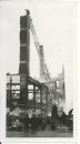 /Winnipeg Free Press Archives Time Building Fire (18) June 9, 1954  On the left, workmen from  R. Litz and Sons.  moved away. The ariel ladder has moved away. A brief  moment later the pillar toppled and crumbled. fparchive