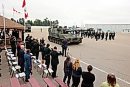 A tank passes ... 