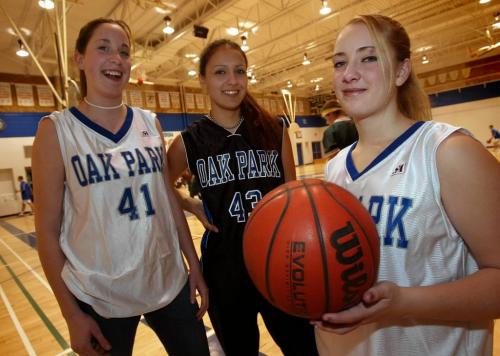 JEFF DE BOOY / WINNIPEG FREE PRESS Sports- Amateur Scene- Oak Park Raiders Basketball players (LtoR) Sabrina Barnes, Katie Lafreniere, and Holly Kitchen (Cariou story). 20021216.