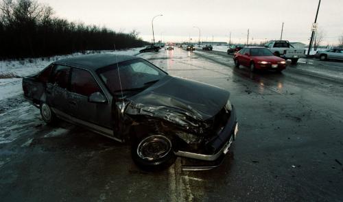 winnipeg- Local- Icy Conditions caused this multi-vehicle accident on Fermor Ave. between Lagimodiere Blvd. and the CN overpass near Plessis Rd. As much as 8 vehicles were involved including a Grey Hound bus that had already left the scene. Jeff De Booy photo. Feb.8th/1999.winnipeg free press