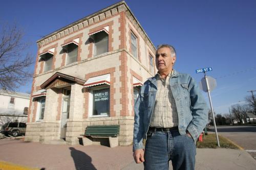 BEAUSEJOUR: NOVEMBER 17, 2004: BEAUSEJOUR Len Wilke, a broker with Wilke & Co Real Estate Services, stands in front of his office building in Beausejour, Manitoba, on Wednesday afternoon. For story by Bill Redekop Photo by Marianne Helm/Winnipeg Free Press