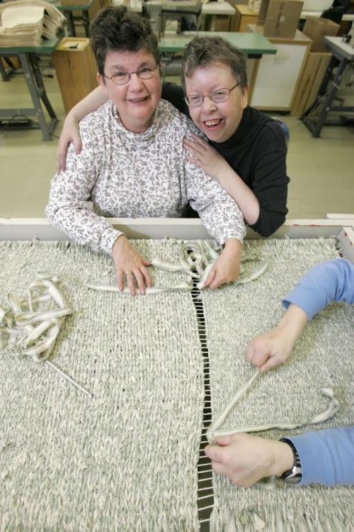 NOTE: As per Bill Redekop's instructions, Darryl Marsch (1-326-9856) will confirm clearance on anyone in this photo.  STEINBACH: NOVEMBER 17, 2004: KINDALE INDUSTRIES Margaret Horst (left) and her good friend Susie Fehr share a laugh while Horst weaves a rug at Kindale Industries in Steinbach, Manitoba, on Wednesday morning. For story by Bill Redekop. Photo by Marianne Helm/Winnipeg Free Press