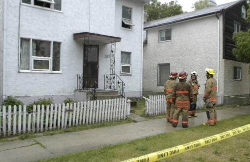 John Woods / Winnipeg Free Press / August 4 2006 - 060804 - Police and Firefighters were called to a fire at 315 Rue de la Cathedral                                                                                                          Friday, August 4/06.