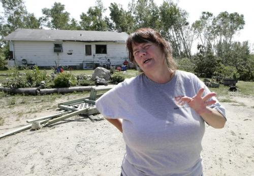 John Woods / Winnipeg Free Press / August 8 2006 - 060808 - Jan Walker gestures as she talks about her experiences Tuesday, August 8/06, a couple of days after a tornado ripped through Gull Lake Saturday, August 5/06.