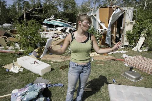 John Woods / Winnipeg Free Press / August 8 2006 - 060808 - Susan Osadczuk gestures as she talks about her experiences Tuesday, August 8/06, a couple of days after a tornado ripped through Gull Lake Saturday, August 5/06.