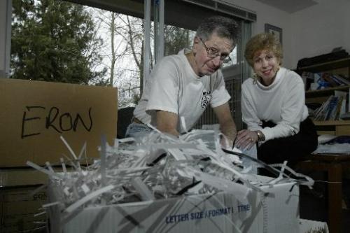 Jim and Mary Tindle does some shredding of his Eron files at his home in Vancouver, BC. April 1, 2005. Last week the former president of Eron Mortgage Corp. Brian Slobogian, was given a six-year prison term on Tuesday in a fraud case called the biggest in British Columbia history. Lyle Stafford/Winnipeg Free Press