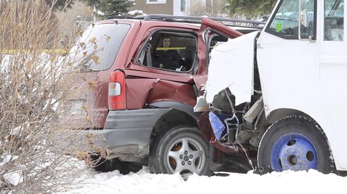 MIKE.DEAL@FREEPRESS.MB.CA 101203 - Friday, December 03, 2010 - A young boy possibly between the ages of 3-5 and his mother were taken to hospital after their mini-van was t-boned by a CanPar truck at the intersection of Riel Ave. and Minnetonka. No word on the injures. MIKE DEAL / WINNIPEG FREE PRESS