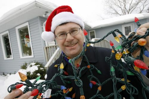 MIKE.DEAL@FREEPRESS.MB.CA 101203 - Friday, December 03, 2010 - Spirit of Christmas Brian Campbell with some donated lights that the ALS Societ of Manitoba is going to use for their Christmas tree bulb fundraiser. See Kevin Rollason story MIKE DEAL / WINNIPEG FREE PRESS