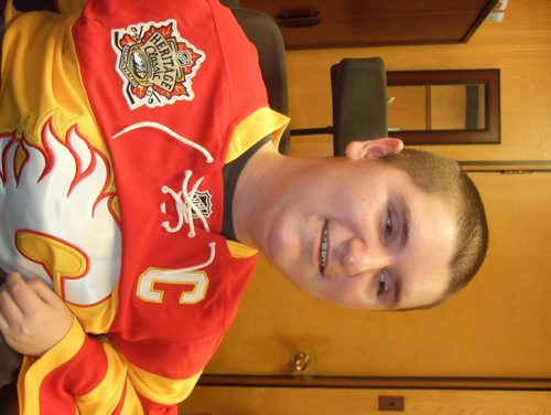 Kyle Buell- 16-year-old off to Calgary for his dream to see the Calgary Flames - for Gordon Sinclair Junior story winnipeg free press