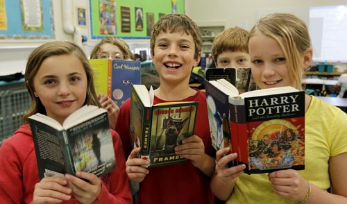 Ruth Bonneville Winnipeg Free Press Dec 08 , 2010 2017 Project - Windsor School grade six students are in the midst of their middle years learning about electricity, becoming a patrol, fitness tests, getting braces, taking band class and becoming the king of the snow hill on the school grounds.  Students show off their favorite books - names from left Aby, Noah, Quinn, Griffin and Hailey.