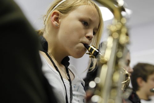 Ruth Bonneville Winnipeg Free Press Dec 08 , 2010 2017 Project - Windsor School grade six students are in the midst of their middle years learning about electricity, becoming a patrol, fitness tests, getting braces, taking band class and becoming the king of the snow hill on the school grounds.  Hailey learns to play the saxophone during band class.
