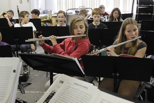 Ruth Bonneville Winnipeg Free Press Dec 08 , 2010 2017 Project - Windsor School grade six students are in the midst of their middle years learning about electricity, becoming a patrol, fitness tests, getting braces, taking band class and becoming the king of the snow hill on the school grounds.  Aby (left) and Sarah (right) play the flute in the front row during band practice.