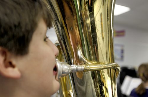 Ruth Bonneville Winnipeg Free Press Dec 08 , 2010 2017 Project - Windsor School grade six students are in the midst of their middle years learning about electricity, becoming a patrol, fitness tests, getting braces, taking band class and becoming the king of the snow hill on the school grounds.  Julian plays the tuba during band class.