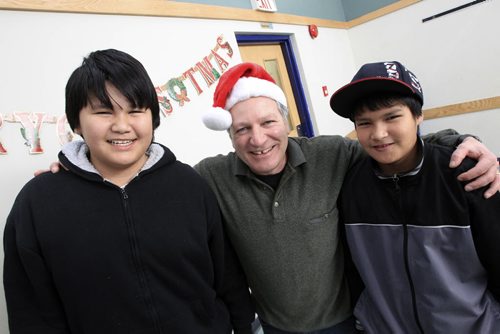 MIKE.DEAL@FREEPRESS.MB.CA 101210 - Friday, December 10, 2010 - Spirit of Giving (l-r) Ronald Gabriel, 13, Phil Chiappetta, co-executive director of Rossbrook house, and Desmond Harper, 12,  both are students in the alternative school program. See Breanne Massey story. MIKE DEAL / WINNIPEG FREE PRESS