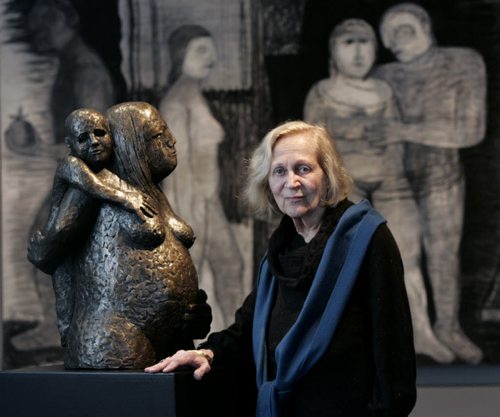WAYNE.GLOWACKI@FREEPRESS.MB.CA Winnipeg artist, Eva Stubbs beside her sculpture called ENIGMA and in back is part of a charcoal drawing called FRIEZE at her show in the Winnipeg Art Gallery titled Eva Stubbs: The Rough Ideal. Alison Mayes story   Winnipeg Free Press Dec. 14 2010