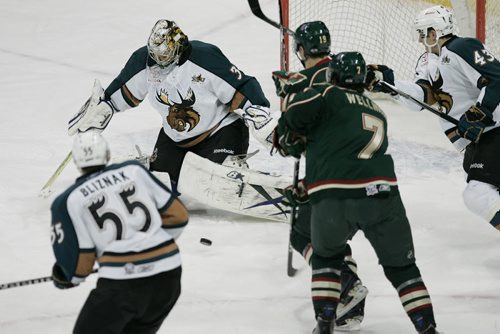 December 18, 2010 - 101218  -  Manitoba Moose goalie Eddie Lack (31) saves the shot as Houston Aeros Jarod Palmer (19) and Casey Wellman (7) look for the rebound during the first period of their AHL game in Winnipeg on Saturday, December 18, 2010.  John Woods / Winnipeg Free Press