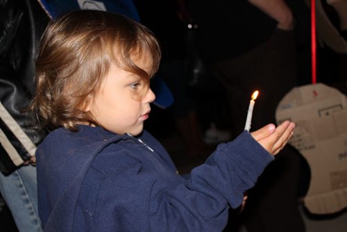 CO9: Iziah Bushby, then 3, holds a candle in honour of his mother at a vigil in the fall of 2010. (Photo taken by Shelley Cook) RRC FOI - Missing Women red river college freedom of information winnipeg free press