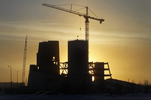 TREVOR HAGAN / WINNIPEG FREE PRESS - The sun rises behind the Canadian Museum for Human Rights around 8:45am.  10-12-26 CMHR